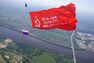 «Технодинамика» развернула в небе самое большое в истории Знамя Победы